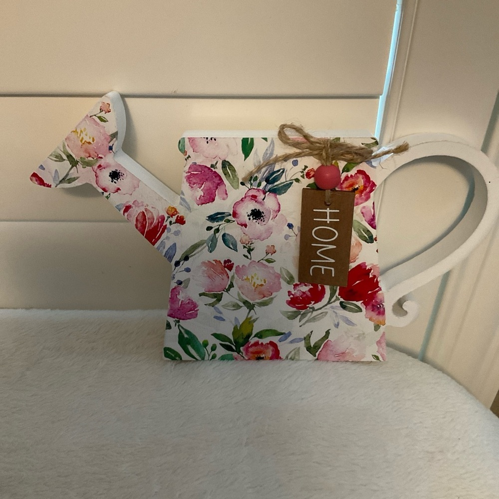 Floral Watering Can Decor with Pink and Red Accents